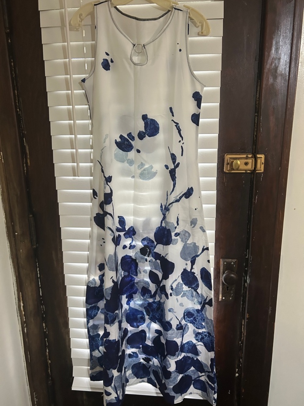 Sleeveless White Dress with Blue Floral Print